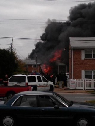 Illustration for article titled F-18 Crashes into Apartment Building and Explodes (Update: No Deaths)